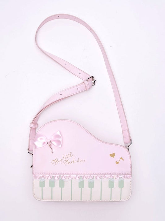 Chic Pink Crossbody Bag With Piano Key Design And Bow Accent