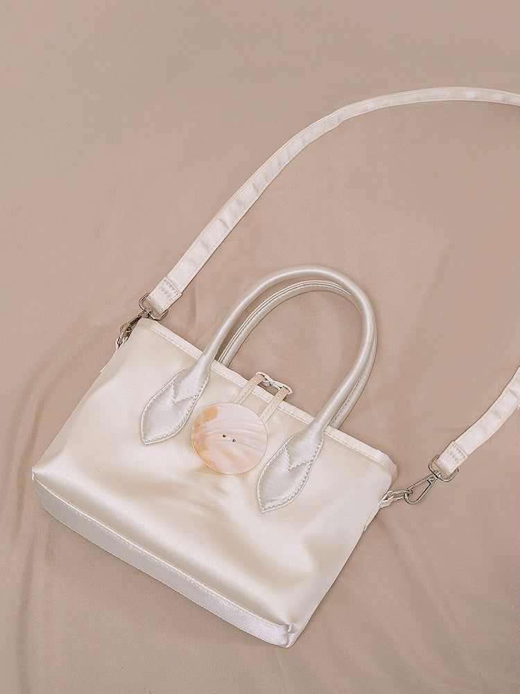 Vintage-Inspired Ivory Satin Handbag In Elegance