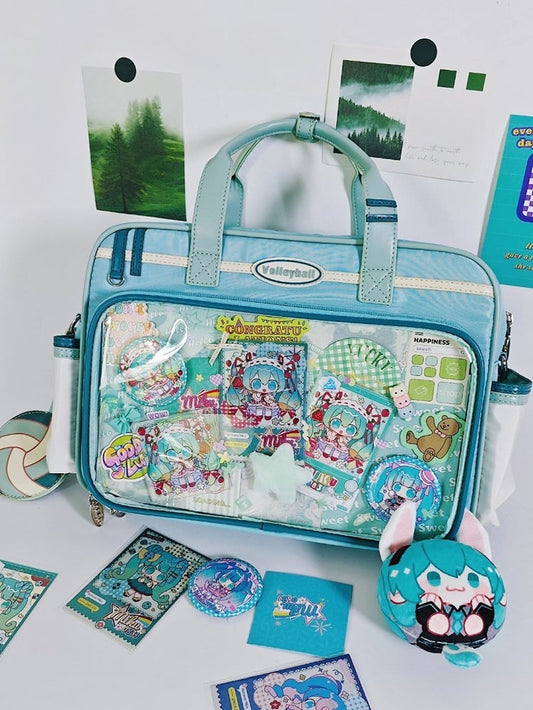 Light Blue Ita Bag with Volleyball Design Charm