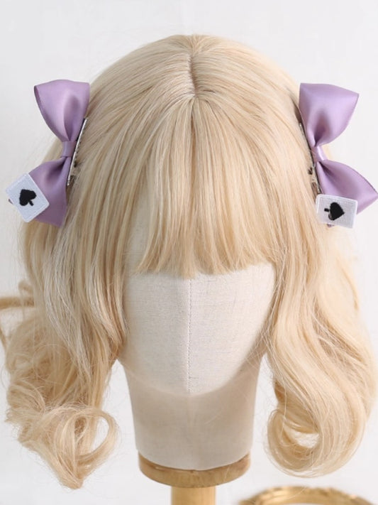 A Pair of Cute Purple Bowknot Hairclips With Spade Card Decorations