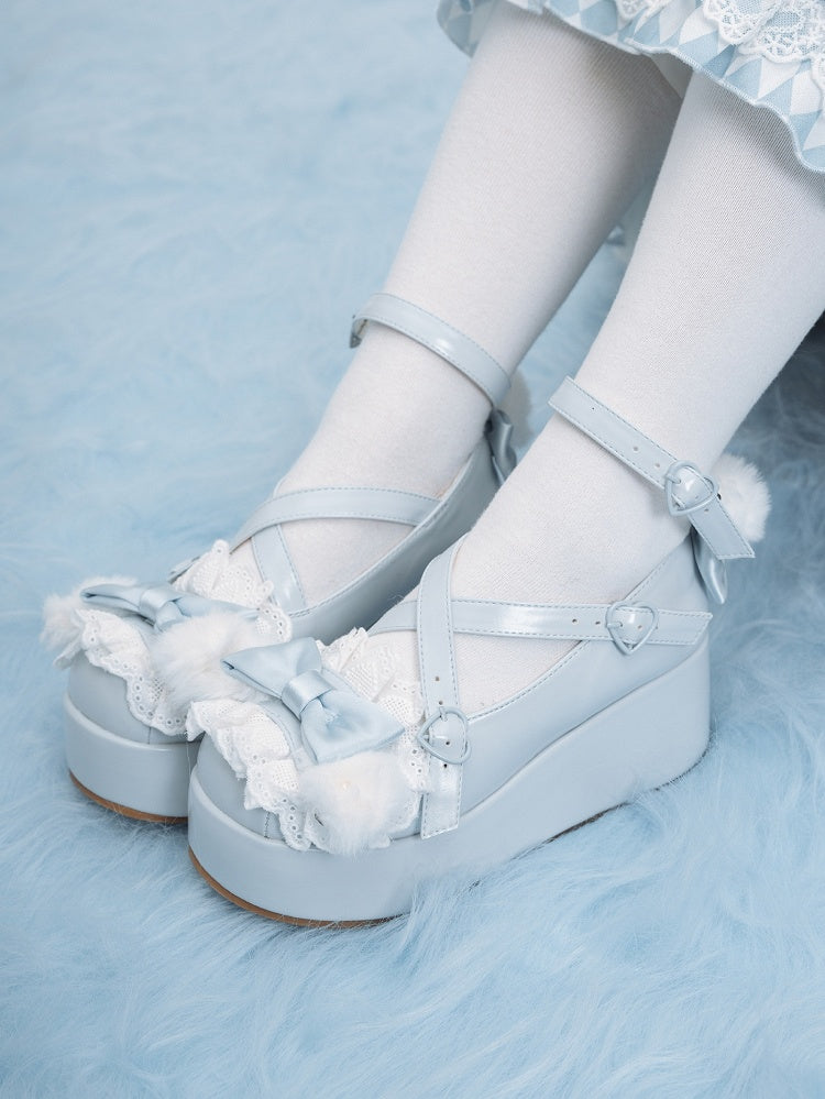 Blue Crisscross Design Plush Bunny Ear Decorated Bow at Top Platforms With Pompon