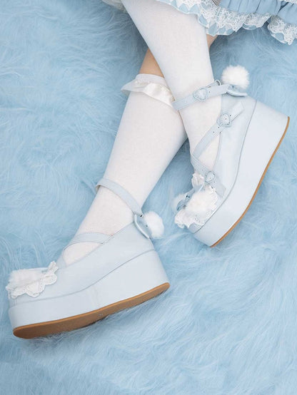 Blue Crisscross Design Plush Bunny Ear Decorated Bow at Top Platforms With Pompon