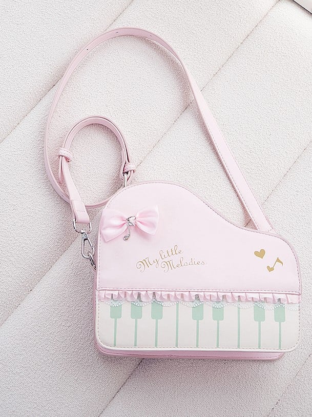 Chic Pink Crossbody Bag With Piano Key Design And Bow Accent
