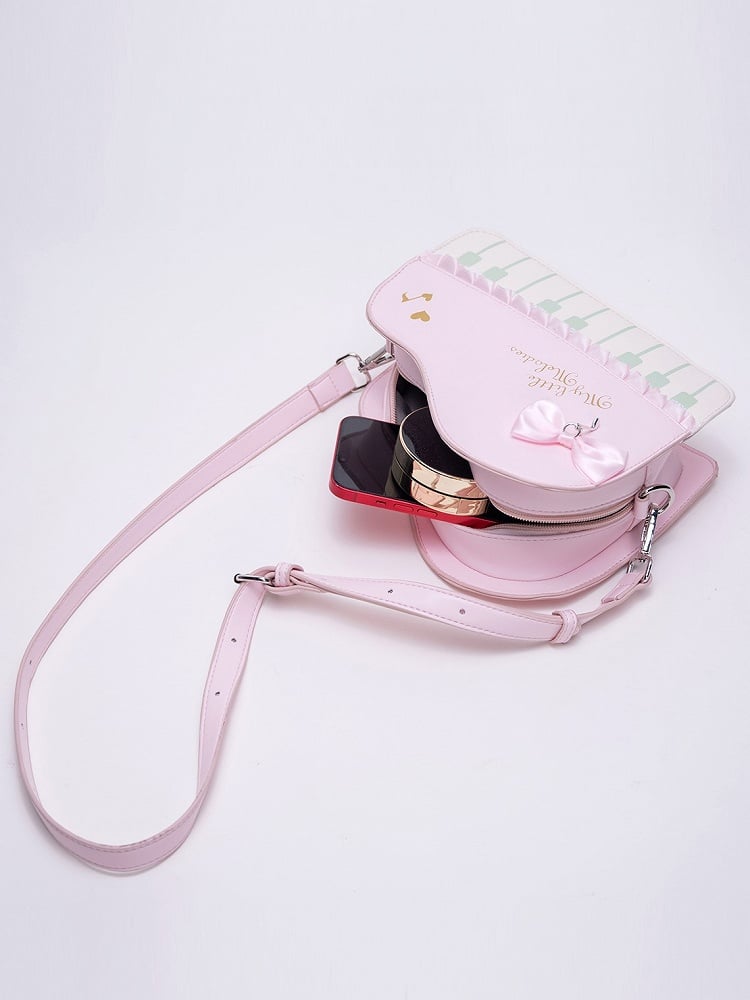 Chic Pink Crossbody Bag With Piano Key Design And Bow Accent
