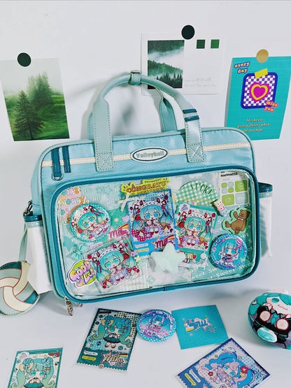 Light Blue Ita Bag with Volleyball Design Charm