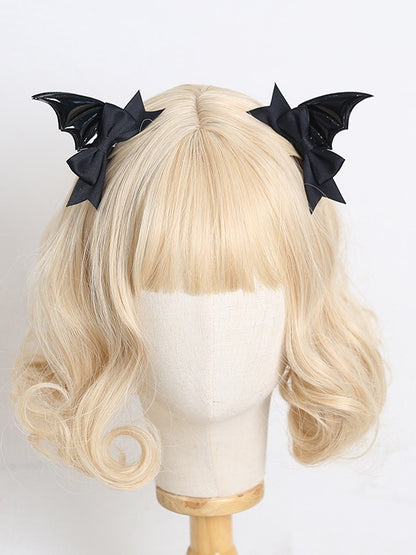 A Pair of Gothic Lolita Black Polished Bat Wing Hairclips with Dark Red / Black / Dark Blue Bowknot Decorations