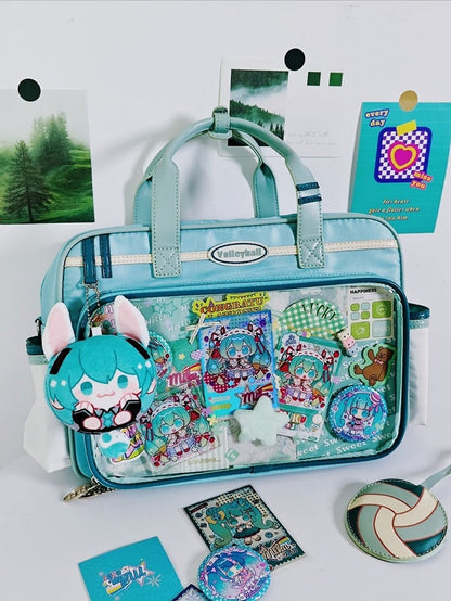 Light Blue Ita Bag with Volleyball Design Charm