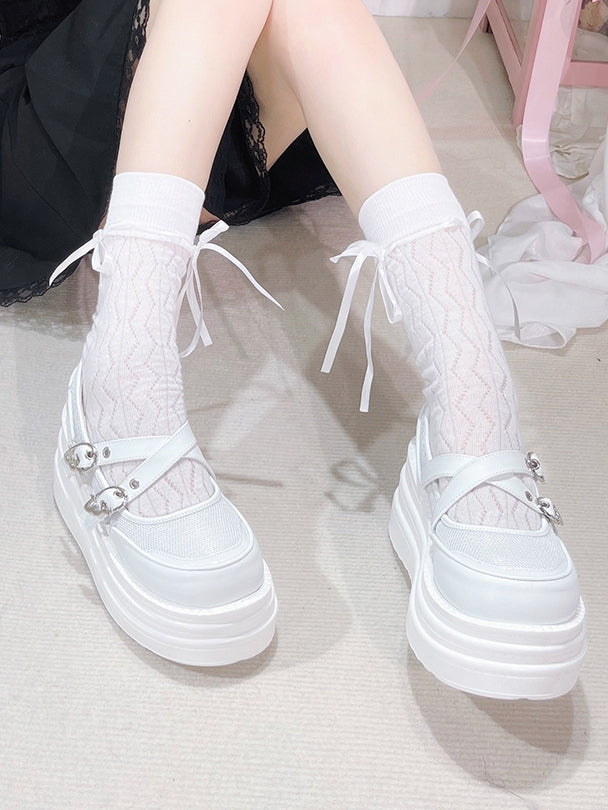 White Crisscross Design Wing Buckles Platforms