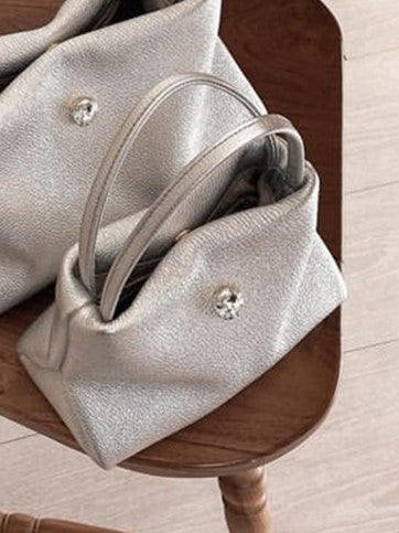 Chic Small-Sized Silver Handbag With Button Closure