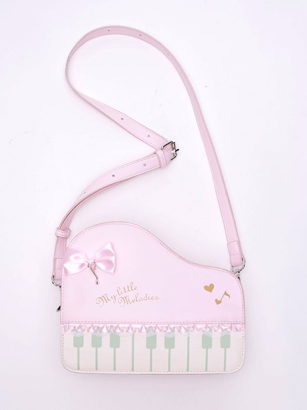 Chic Pink Crossbody Bag With Piano Key Design And Bow Accent