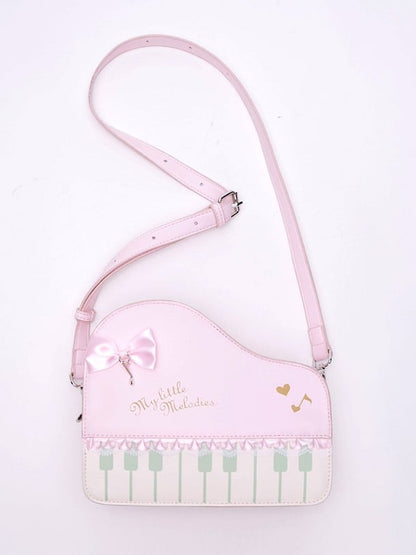 Chic Pink Crossbody Bag With Piano Key Design And Bow Accent