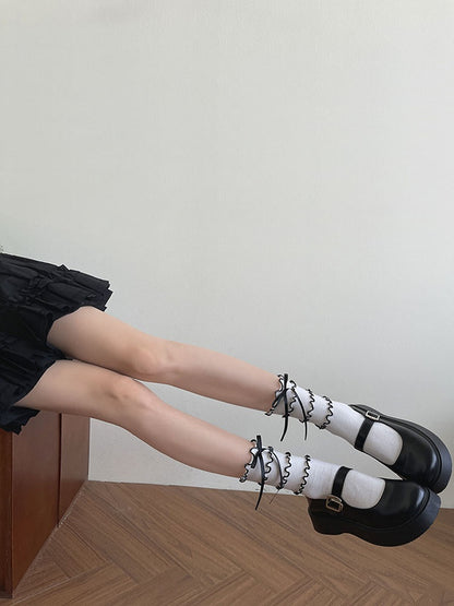White Calf Socks With Black Bowknot Tiered Ruffle Trims