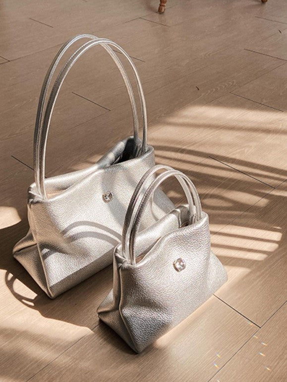 Chic Small-Sized Silver Handbag With Button Closure