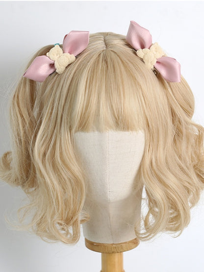 A Pair of Pink Bowknot Hairclips with Beige Bear Decorations