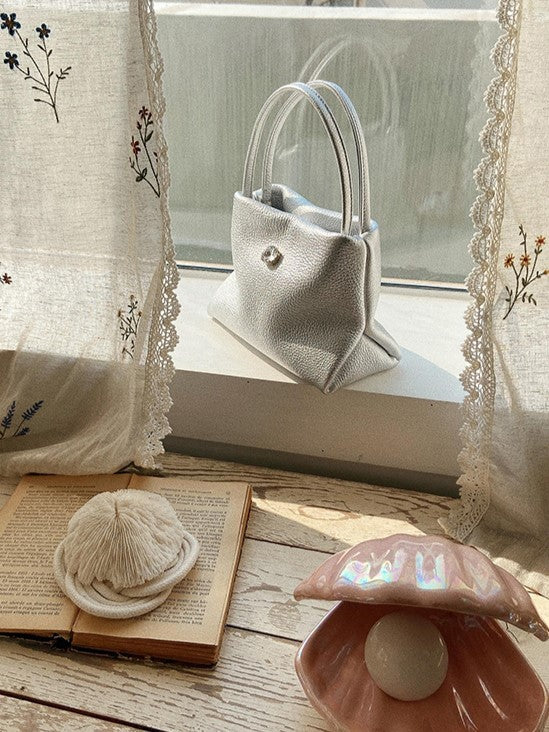 Chic Small-Sized Silver Handbag With Button Closure