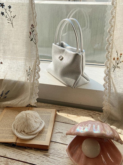 Chic Small-Sized Silver Handbag With Button Closure