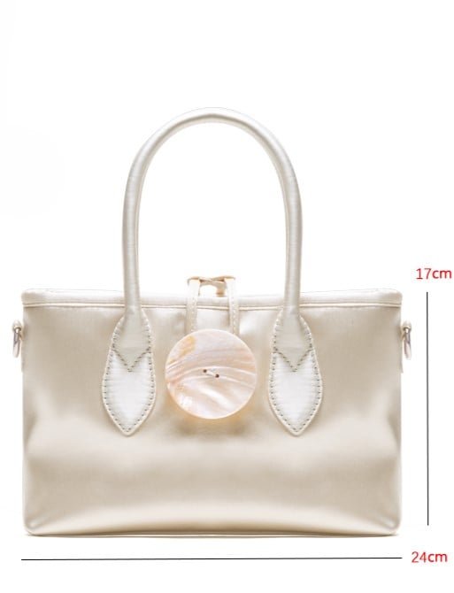 Vintage-Inspired Ivory Satin Handbag In Elegance