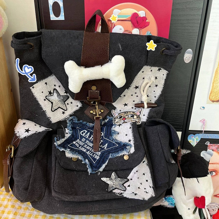 Black and white Washed Canvas Drawstring Backpack with Distressed Star Patches