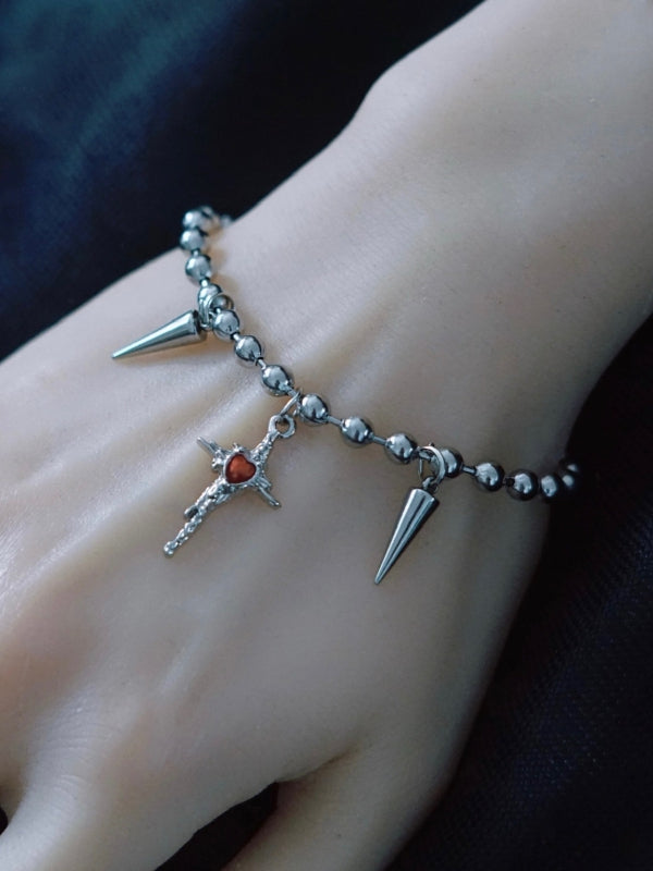Silver Gothic Cross And Studs Charm Bracelet