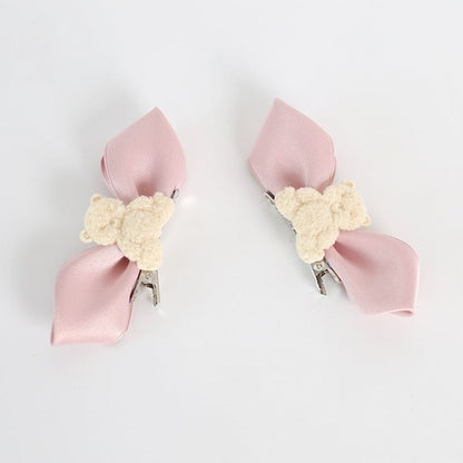 A Pair of Pink Bowknot Hairclips with Beige Bear Decorations