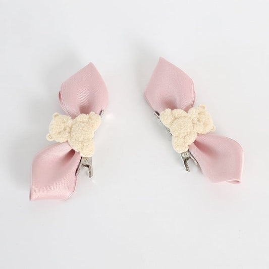 A Pair of Pink Bowknot Hairclips with Beige Bear Decorations