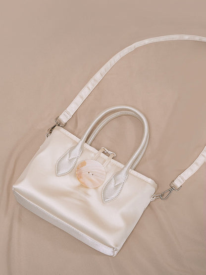 Vintage-Inspired Ivory Satin Handbag In Elegance