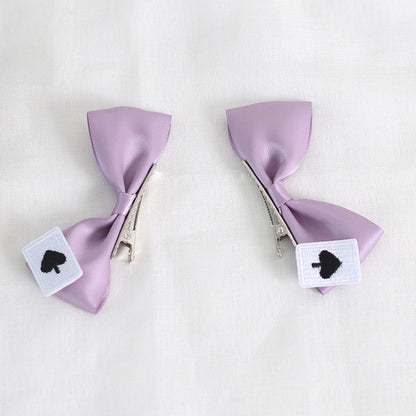 A Pair of Cute Purple Bowknot Hairclips With Spade Card Decorations