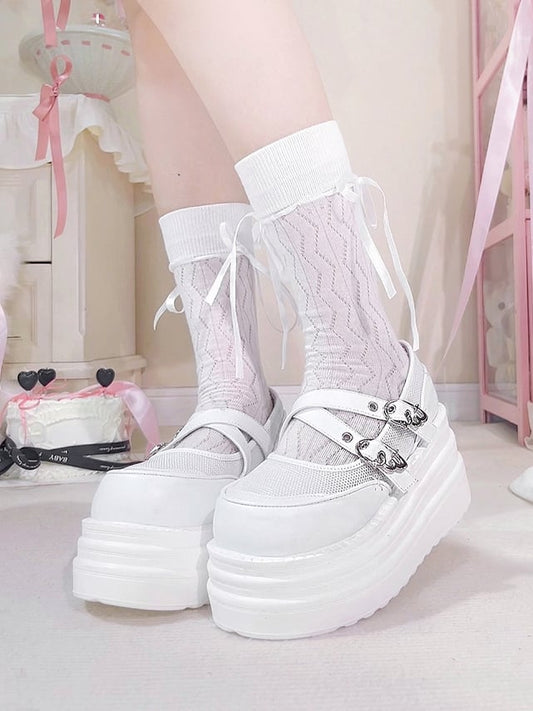 White Crisscross Design Wing Buckles Platforms