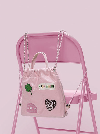 Sweet Pink Diamond Quilted Drawstring Backpack With Clover And Letter Embroidery