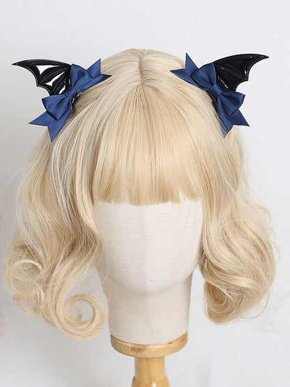 A Pair of Gothic Lolita Black Polished Bat Wing Hairclips with Dark Red / Black / Dark Blue Bowknot Decorations