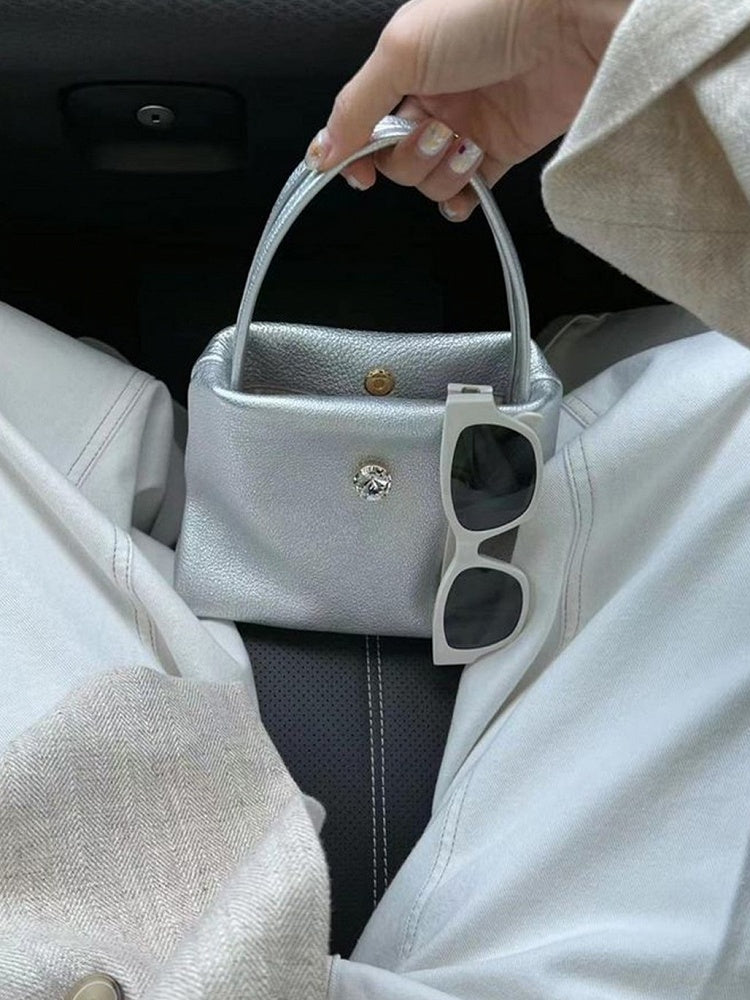 Chic Small-Sized Silver Handbag With Button Closure