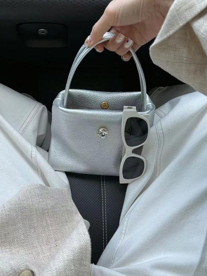 Chic Small-Sized Silver Handbag With Button Closure