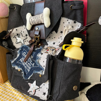 Black and white Washed Canvas Drawstring Backpack with Distressed Star Patches