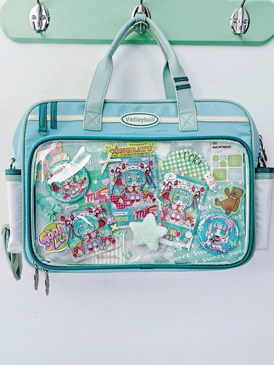 Light Blue Ita Bag with Volleyball Design Charm