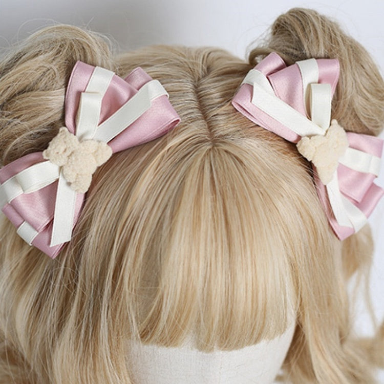 A Pair of Sweet Beige and Pink Bowknot Hairclips with Bear Decorations