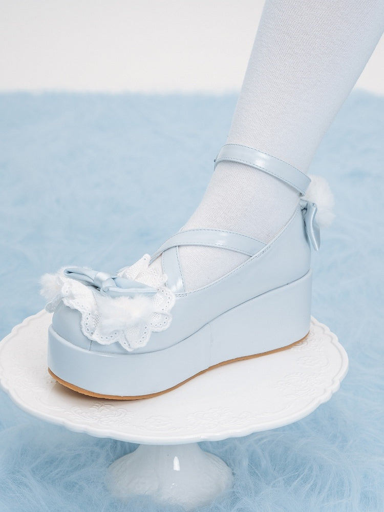 Blue Crisscross Design Plush Bunny Ear Decorated Bow at Top Platforms With Pompon