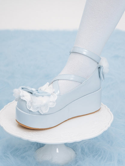 Blue Crisscross Design Plush Bunny Ear Decorated Bow at Top Platforms With Pompon